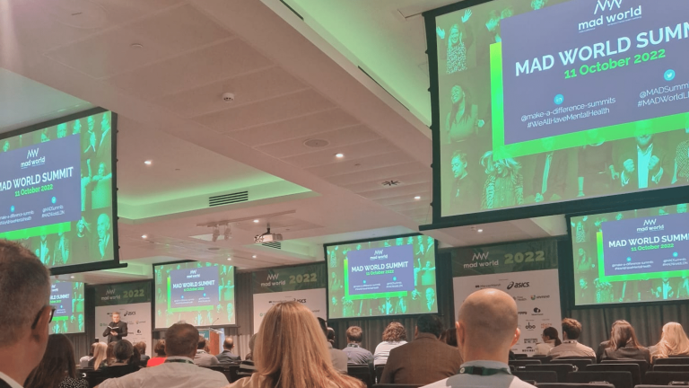 Compass Associates - Mad World Health Summit 2022 - conference screen and stage