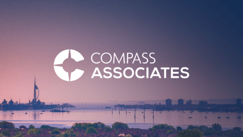 Compass Associates - Part of CRS - View of Portsmouth skyline with iconic landmarks with Compass Associates logo in white in the centre of the image