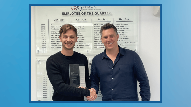 Compass Associates - Employee of the Quarter - Josh Cooper Employee of the Quarter - Josh is holding his trophy and and shaking hands with Managing Director Sam Leighton-Smith for a photo