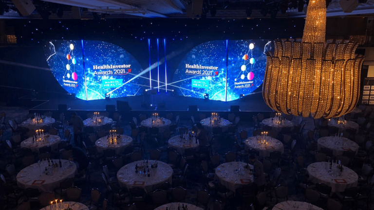 Compass Associates - HealthInvestor Awards 2021 view of the room decorated for the awards